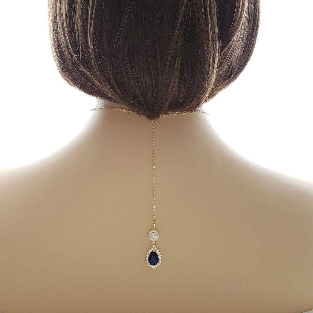 Gold necklace with blue crystal backdrop