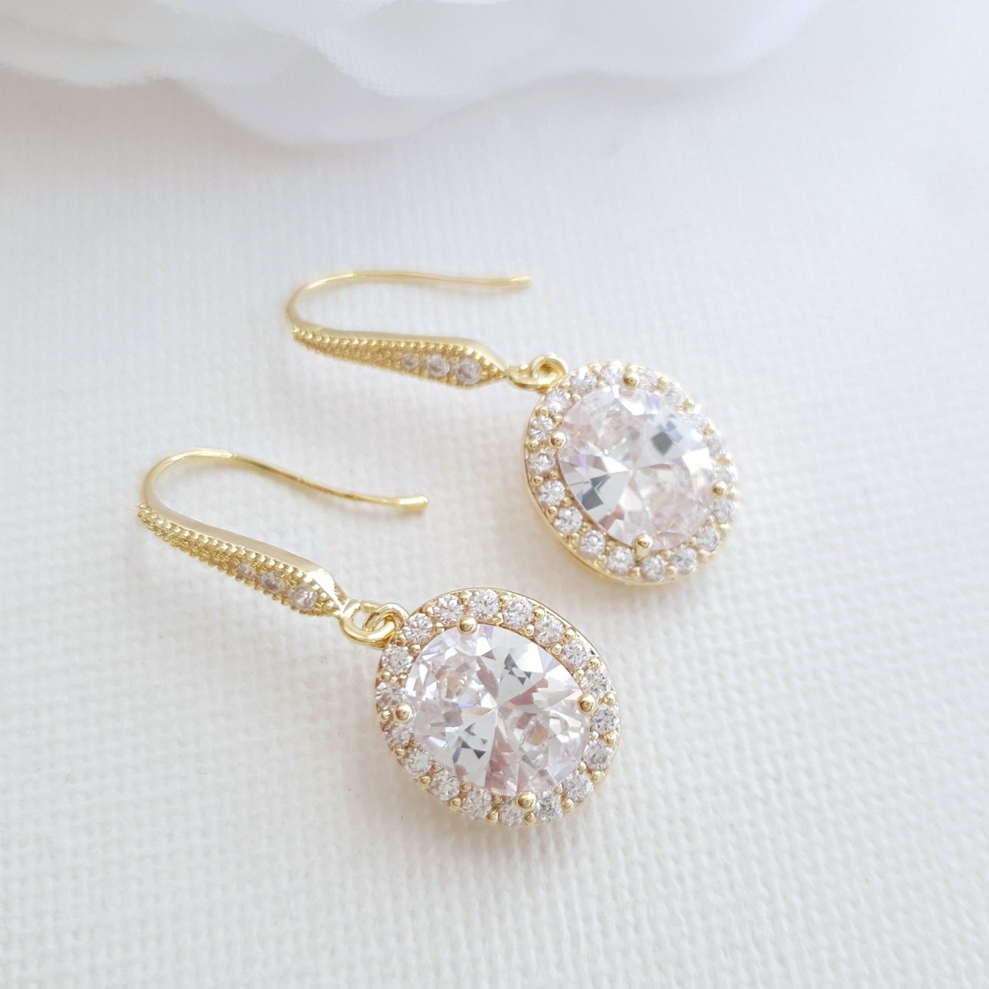 Petite boucle d'oreille pendante en or rose de forme ovale-Emily