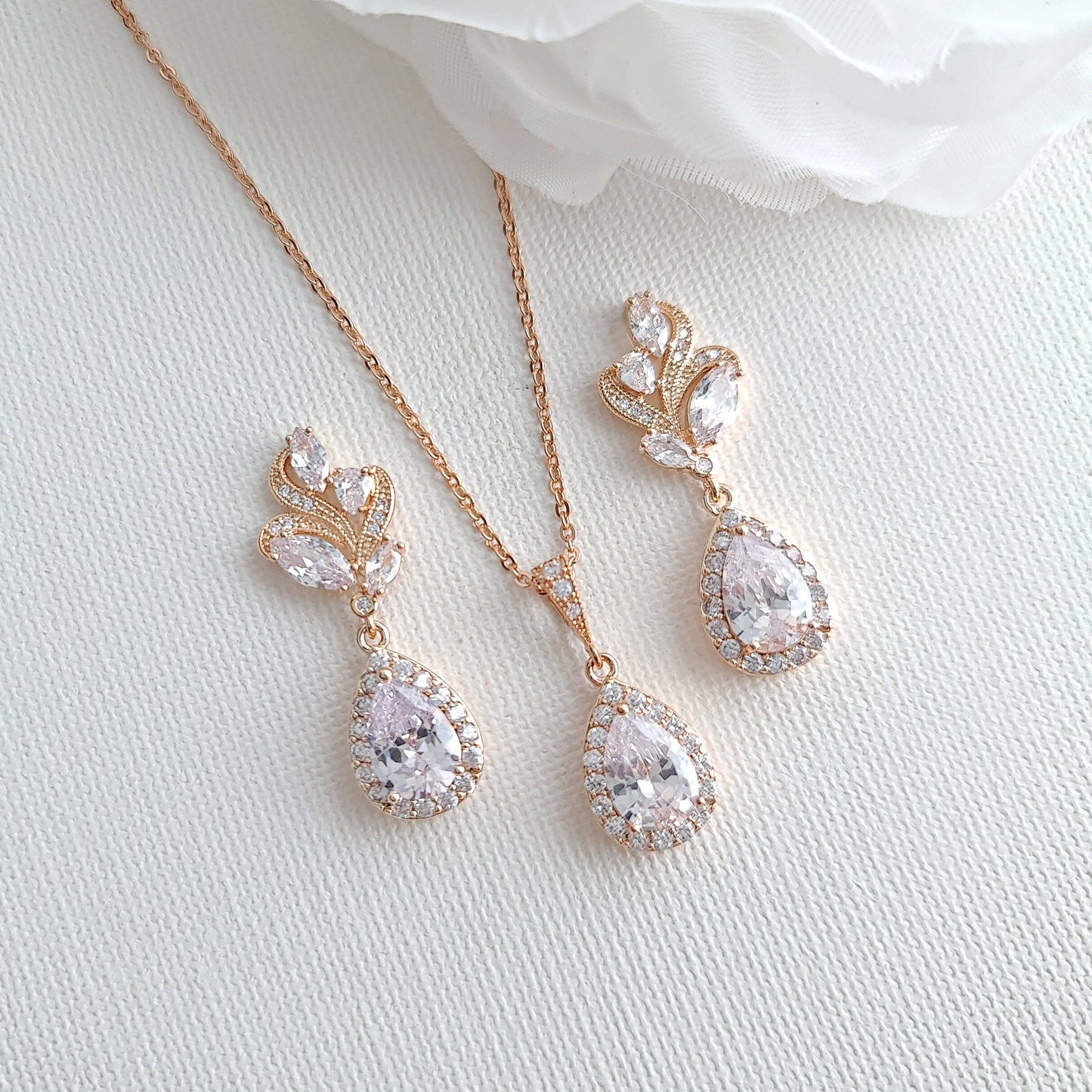 Conjunto de joyas de oro rosa para boda ondulado