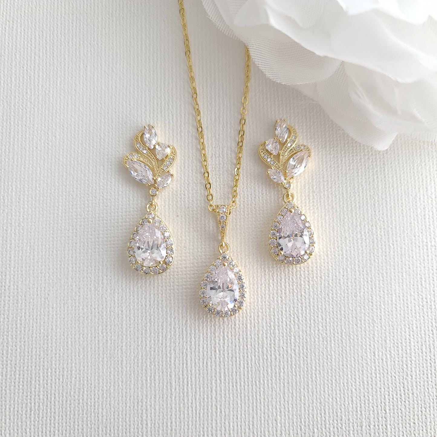 Conjunto de joyas de oro rosa para boda ondulado