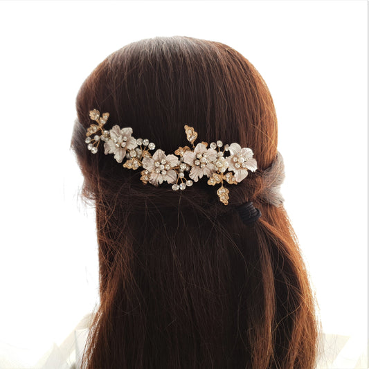 Peigne à cheveux doré pour mariages avec fleurs et feuilles - Gardénia